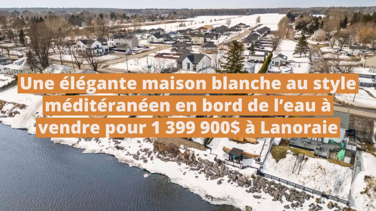Une élégante maison blanche au style méditéranéen en bord de l'eau à vendre pour 1 399 900$ à Lanoraie