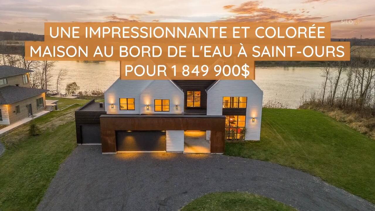 Une impressionnante et colorée maison au bord de l'eau à Saint-Ours pour 1 849 900$