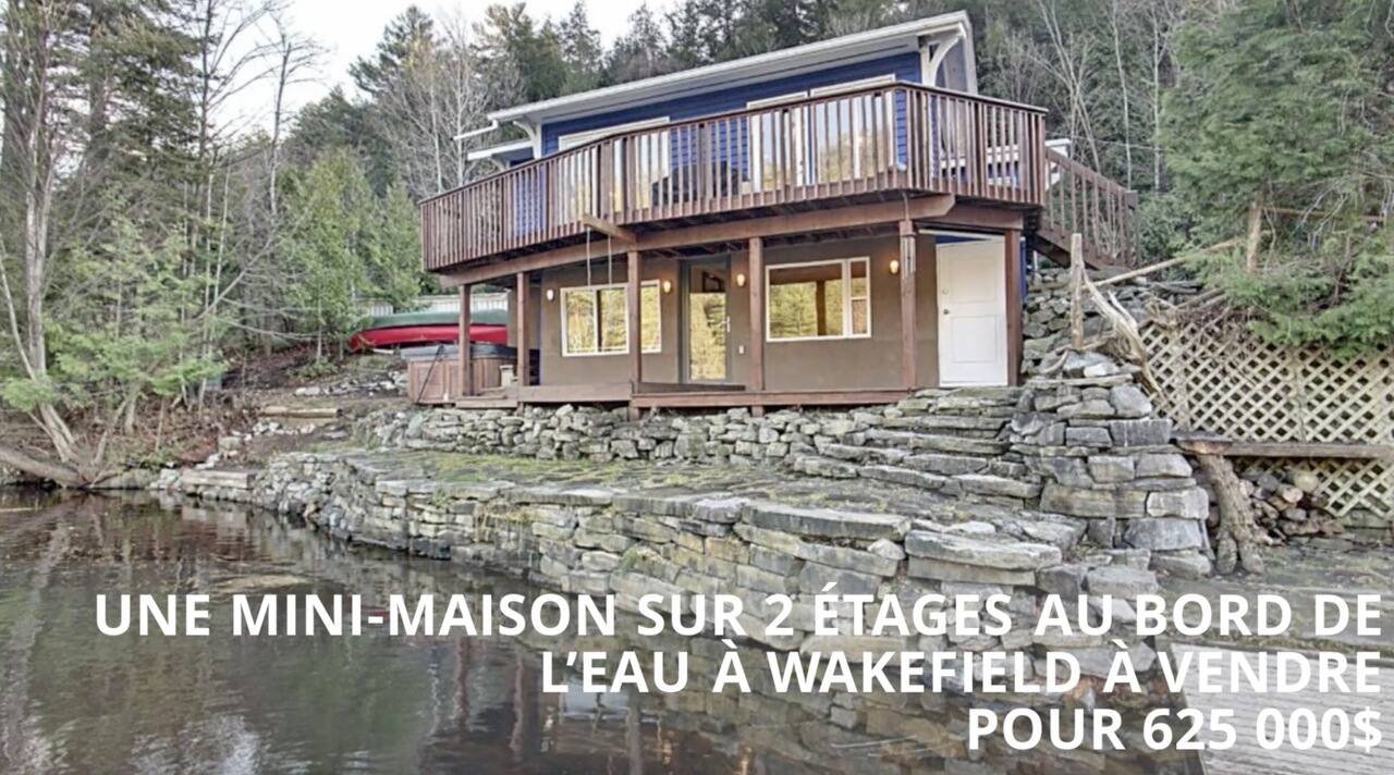 Une mini-maison sur 2 étages au bord de l'eau à Wakefield à vendre pour 625 000$