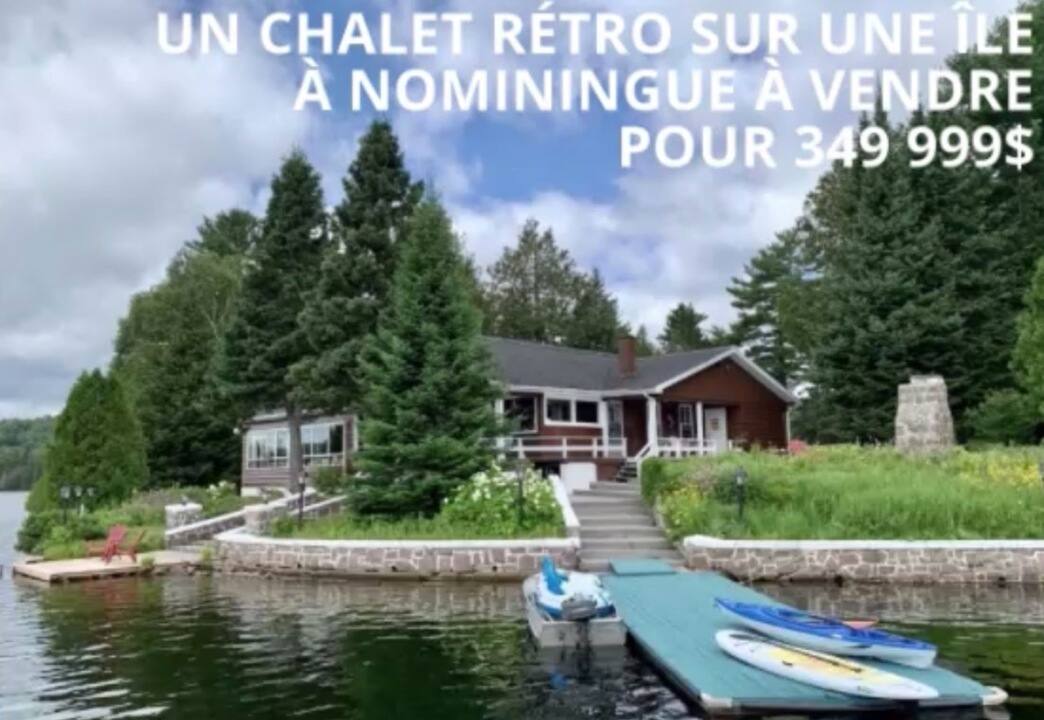 Un chalet rétro sur une île à Nominingue à vendre pour 349 999$